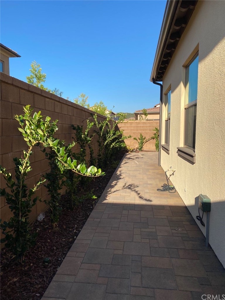 63 Singer Irvine, CA 92620 - Photo 33 of 33 a view of a pathway of a house with a yard