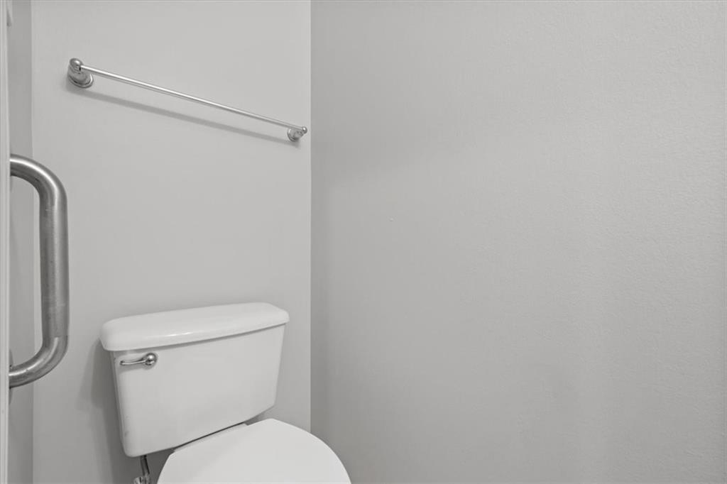 125 Park Place McKees Rocks, PA 15136 - Photo 19 of 44 a white toilet sitting next to a shower