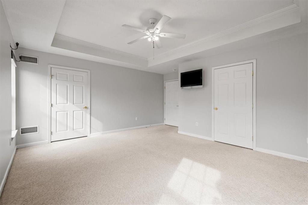 125 Park Place McKees Rocks, PA 15136 - Photo 20 of 44 a view of an empty room with a ceiling fan