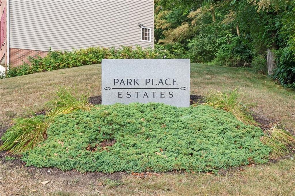 125 Park Place McKees Rocks, PA 15136 - Photo 5 of 44 a sign on the side of a road