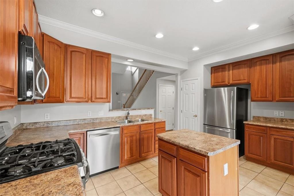 125 Park Place McKees Rocks, PA 15136 - Photo 6 of 44 a kitchen with a sink stove and refrigerator