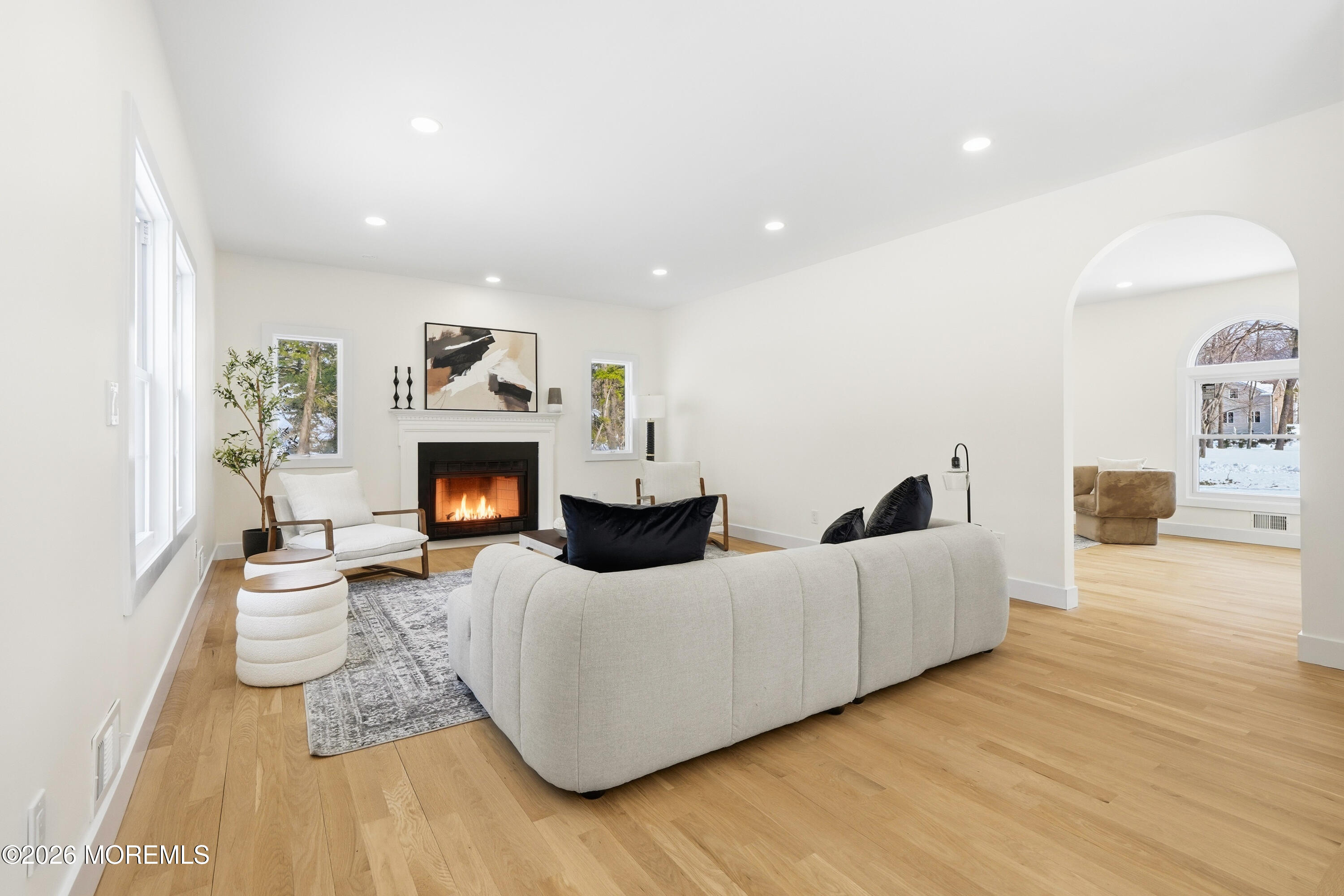 20 Overlook Drive Jackson, NJ 08527 - Photo 21 of 82 a living room with furniture and a fireplace