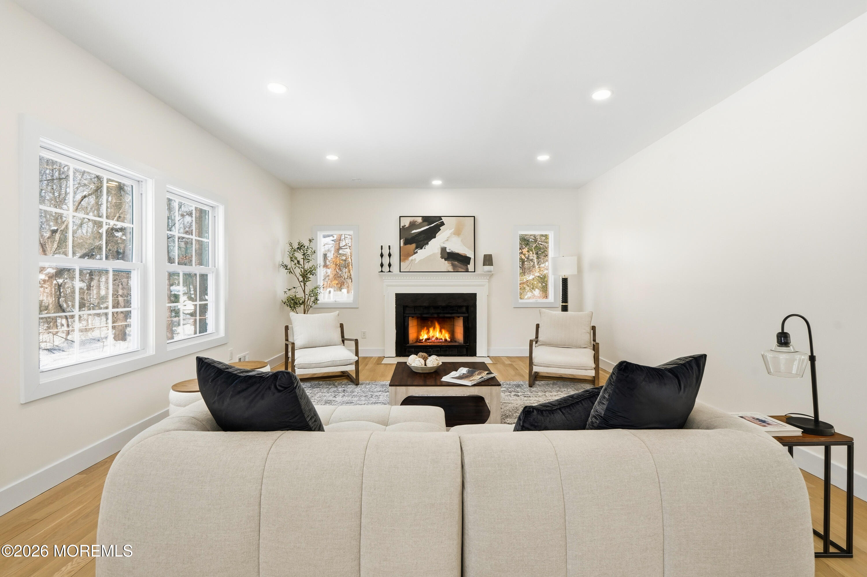 20 Overlook Drive Jackson, NJ 08527 - Photo 22 of 82 a living room with furniture and a fireplace