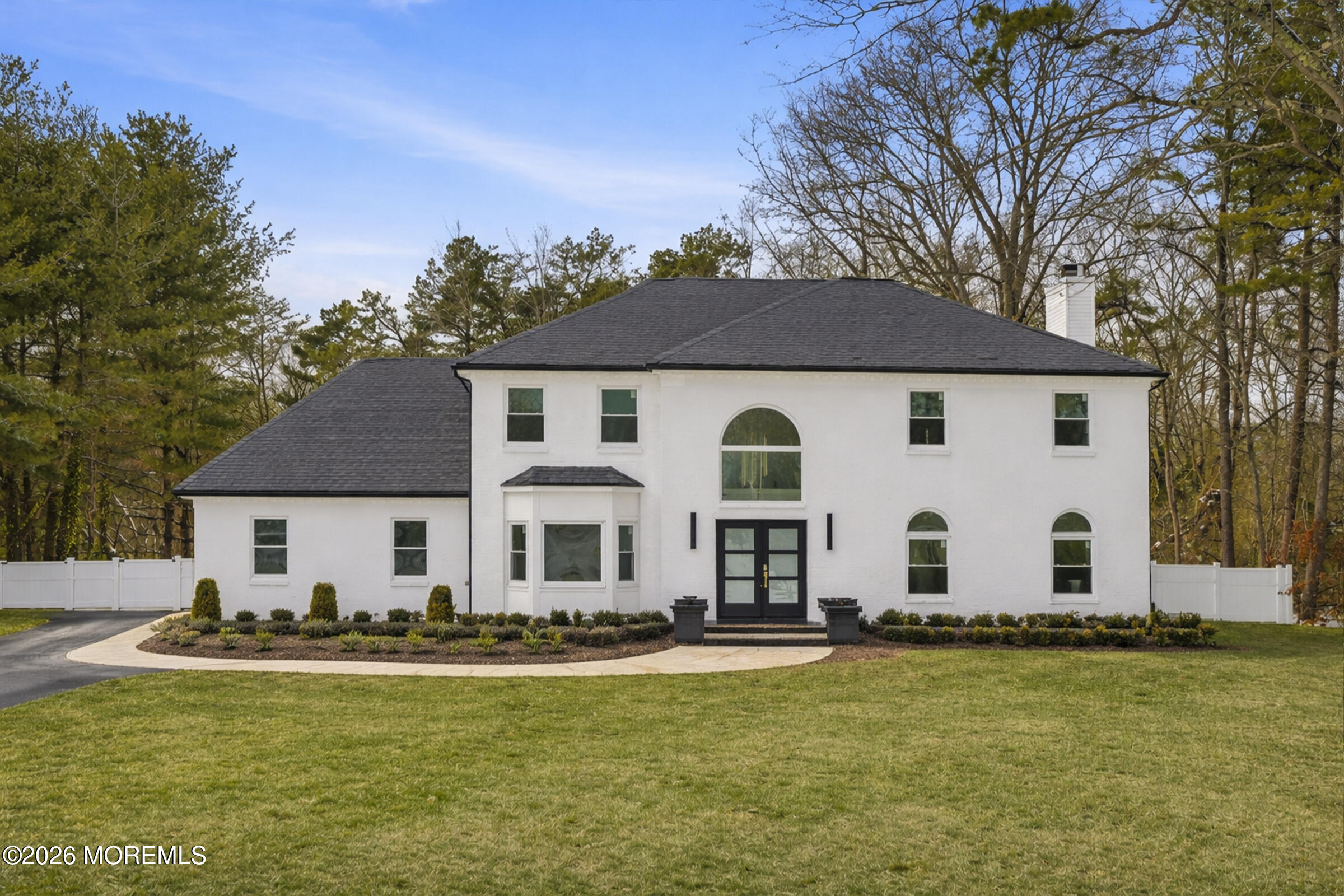 20 Overlook Drive Jackson, NJ 08527 - Photo 3 of 82 a view of a white house with a swimming pool and porch