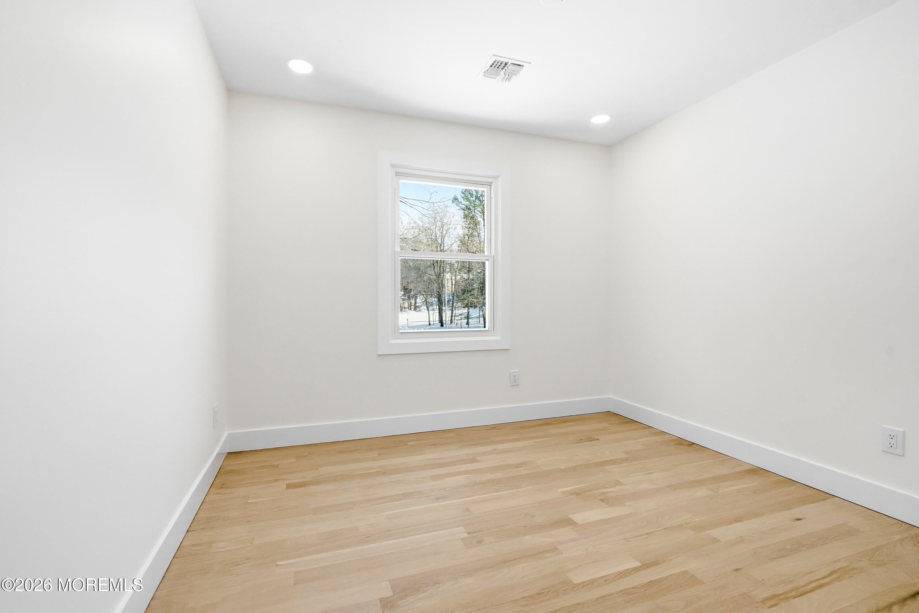 20 Overlook Drive Jackson, NJ 08527 - Photo 52 of 82 an empty room with wooden floor and windows