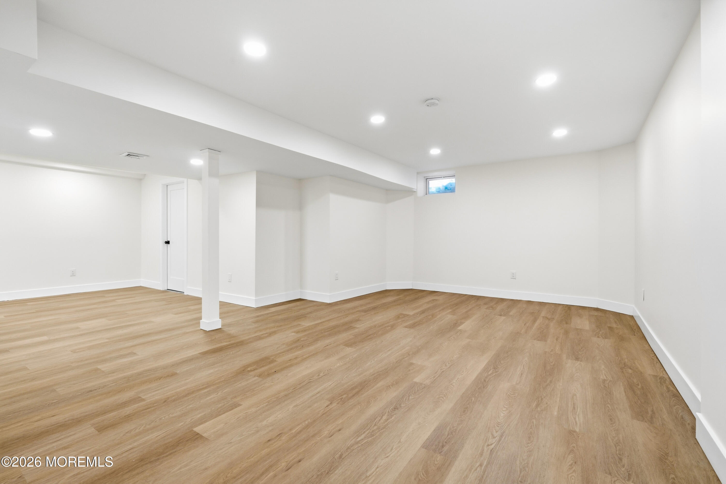 20 Overlook Drive Jackson, NJ 08527 - Photo 56 of 82 a view of an empty room with wooden floor