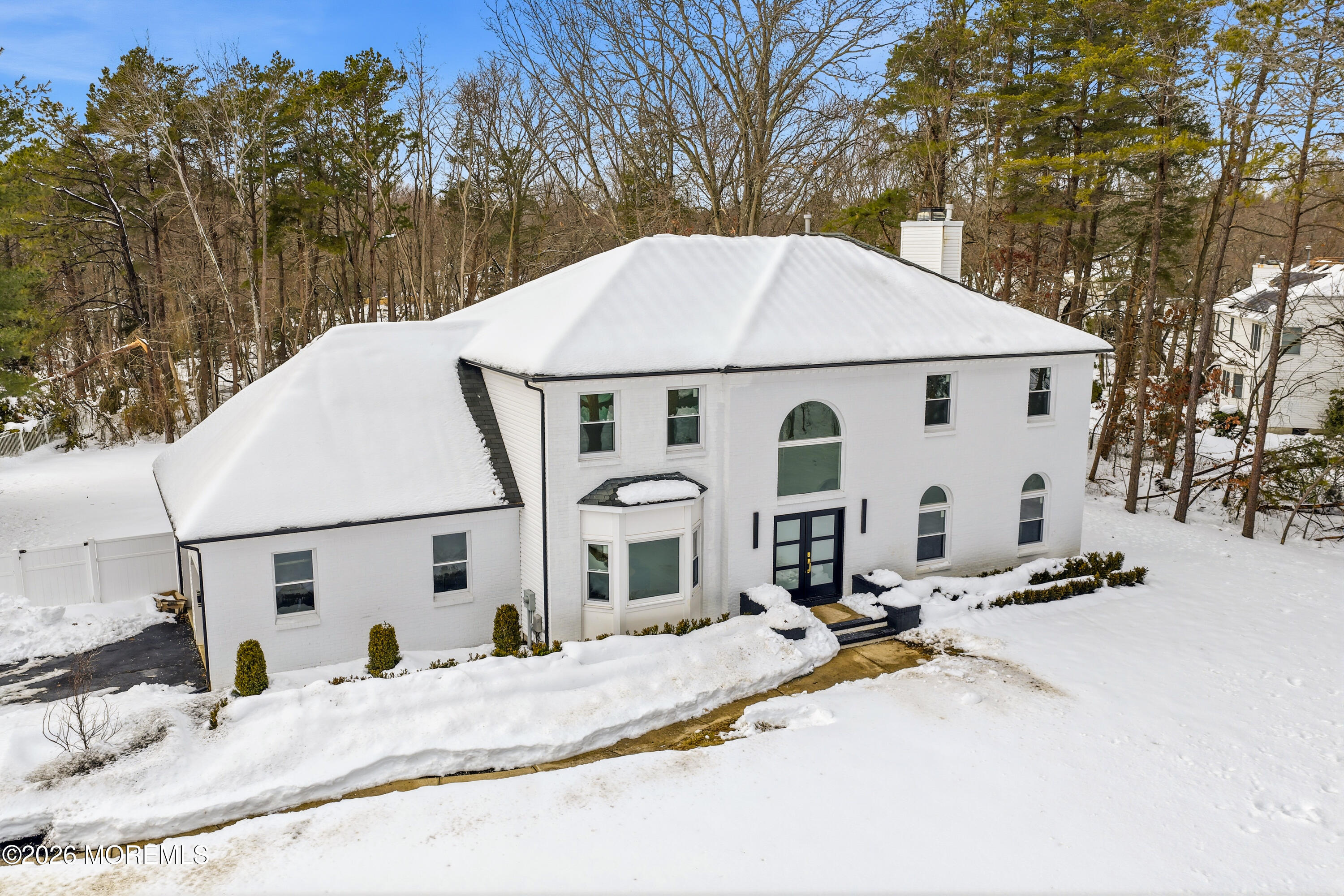 20 Overlook Drive Jackson, NJ 08527 - Photo 62 of 82 a view of a white house with a yard and sitting area