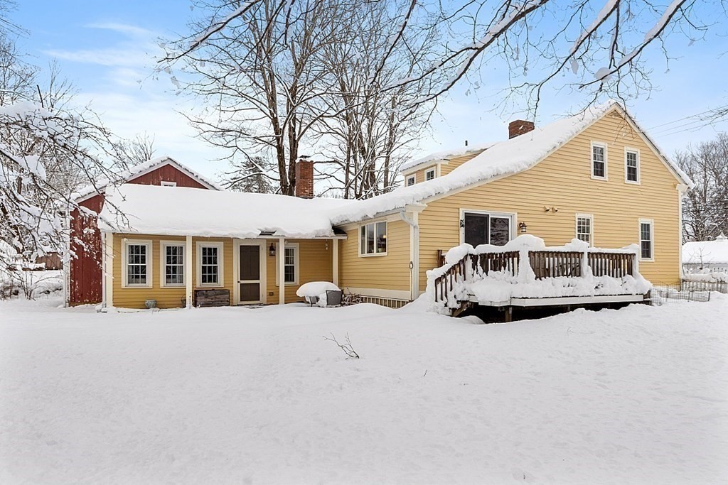 4 Hardwick Road Petersham, MA 01366 - Photo 32 of 42 a view of a house with a yard covered in snow