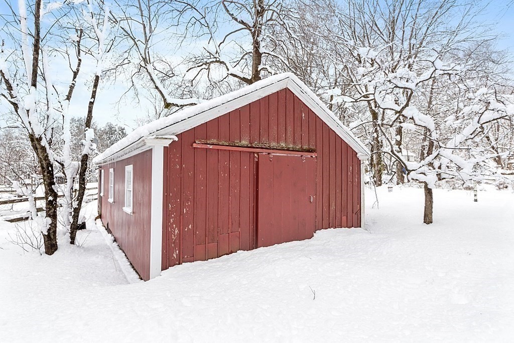 4 Hardwick Road Petersham, MA 01366 - Photo 36 of 42 a view of a house with a yard covered in snow
