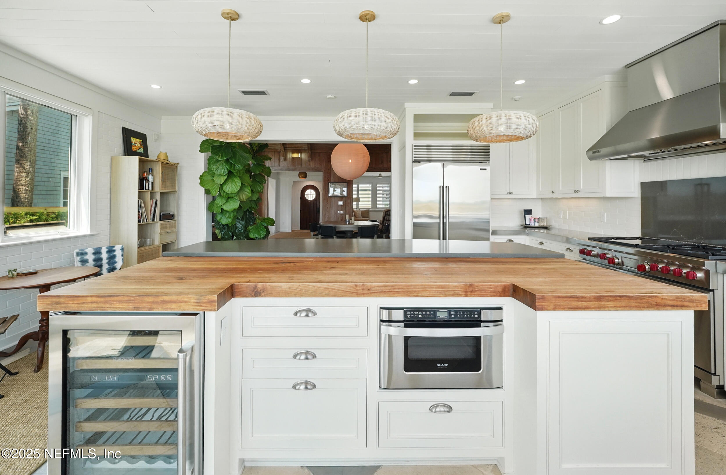 816 Ocean Front Neptune Beach, FL 32266 - Photo 20 of 65 a kitchen with a stove and a microwave