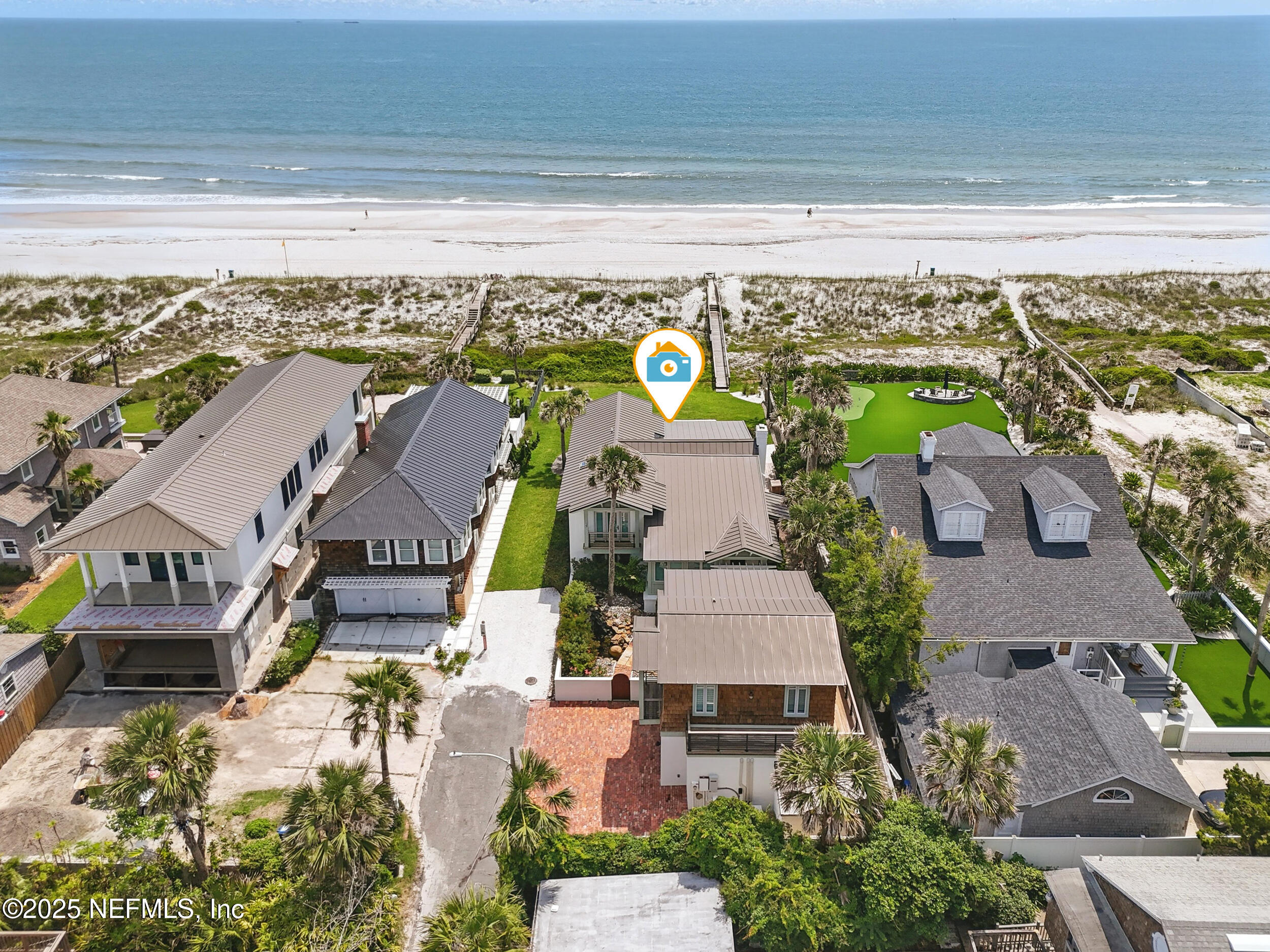 816 Ocean Front Neptune Beach, FL 32266 - Photo 3 of 65 an aerial view of a house with a ocean view