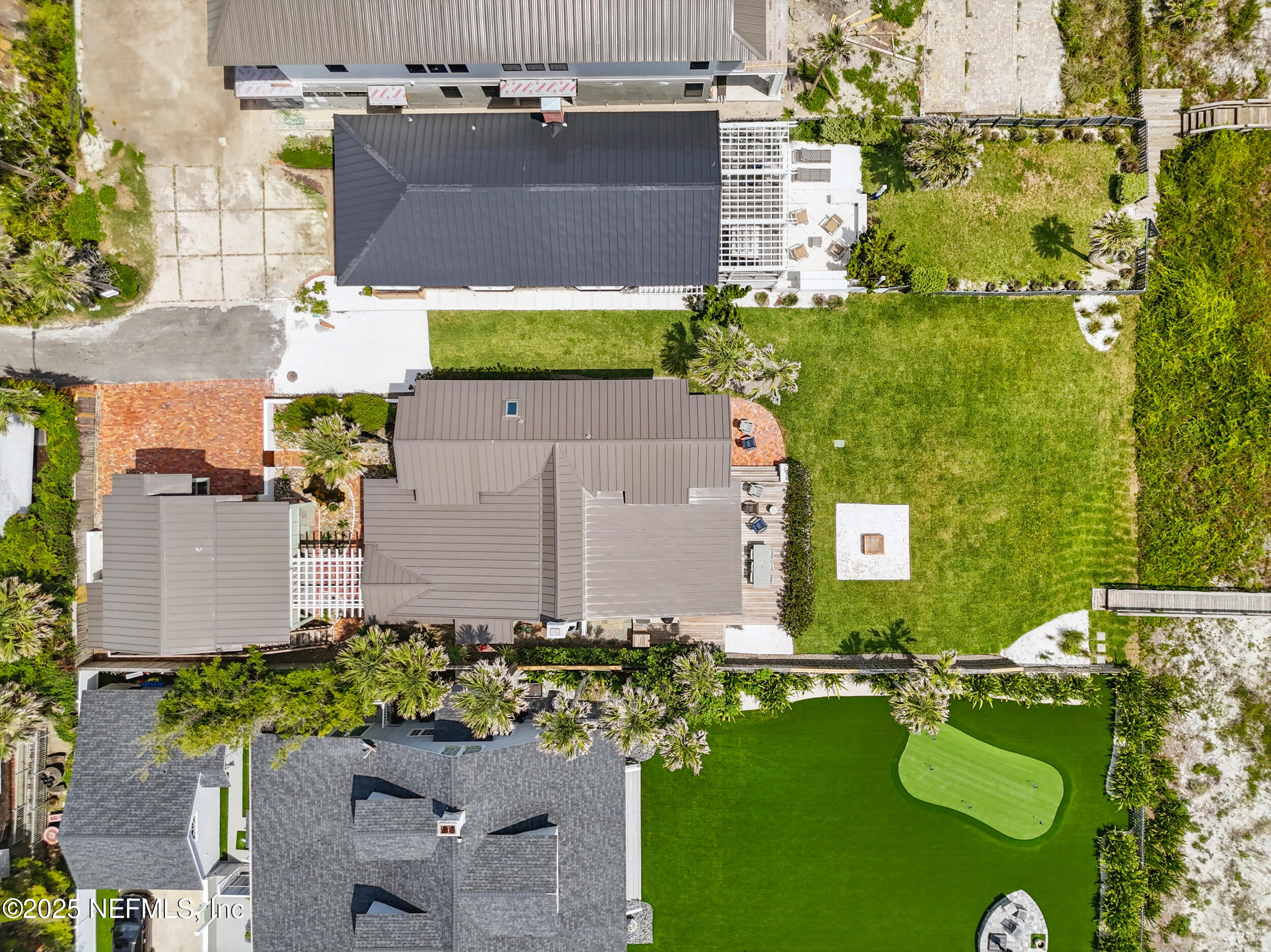 816 Ocean Front Neptune Beach, FL 32266 - Photo 59 of 65 an aerial view of a house