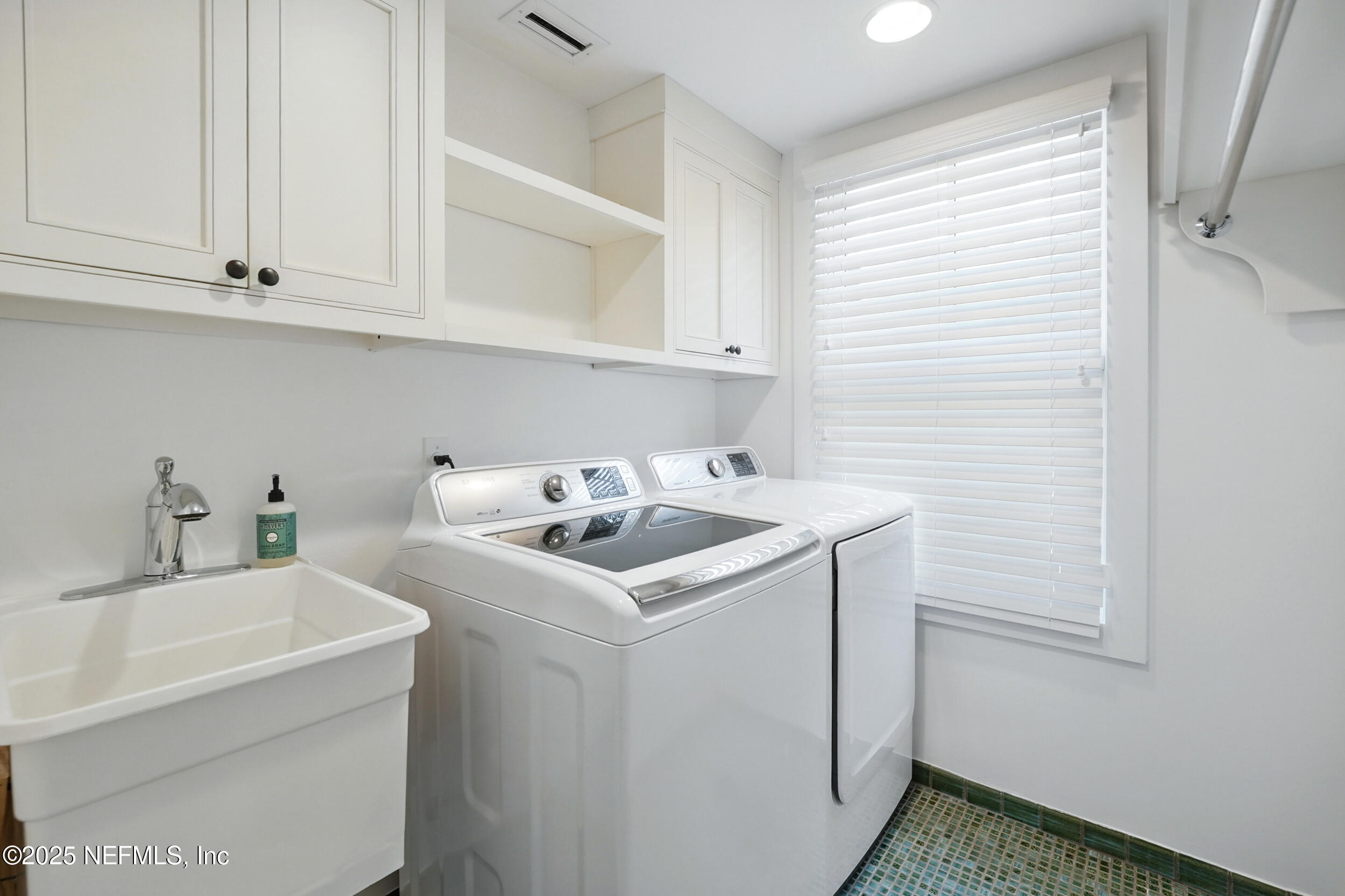 816 Ocean Front Neptune Beach, FL 32266 - Photo 63 of 65 a utility room with dryer and washer