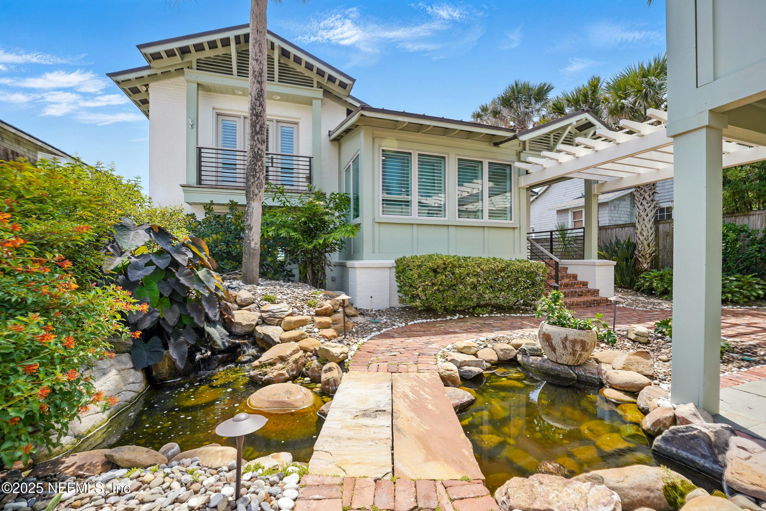 816 Ocean Front Neptune Beach, FL 32266 - Photo 7 of 65 a front view of a house with a yard