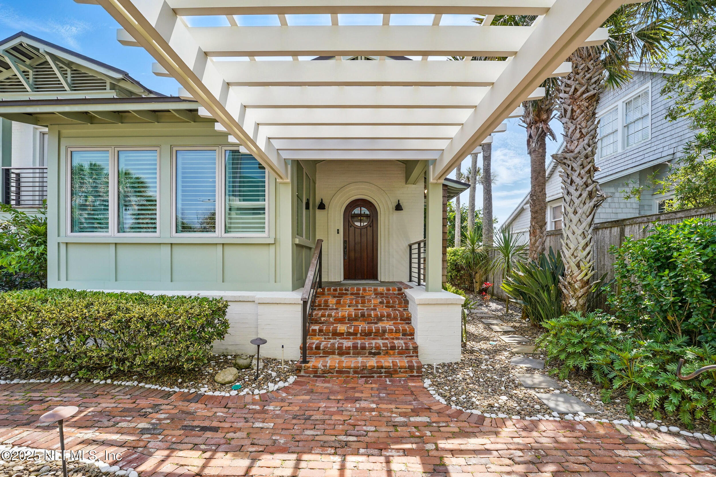 816 Ocean Front Neptune Beach, FL 32266 - Photo 8 of 65 a front view of a house