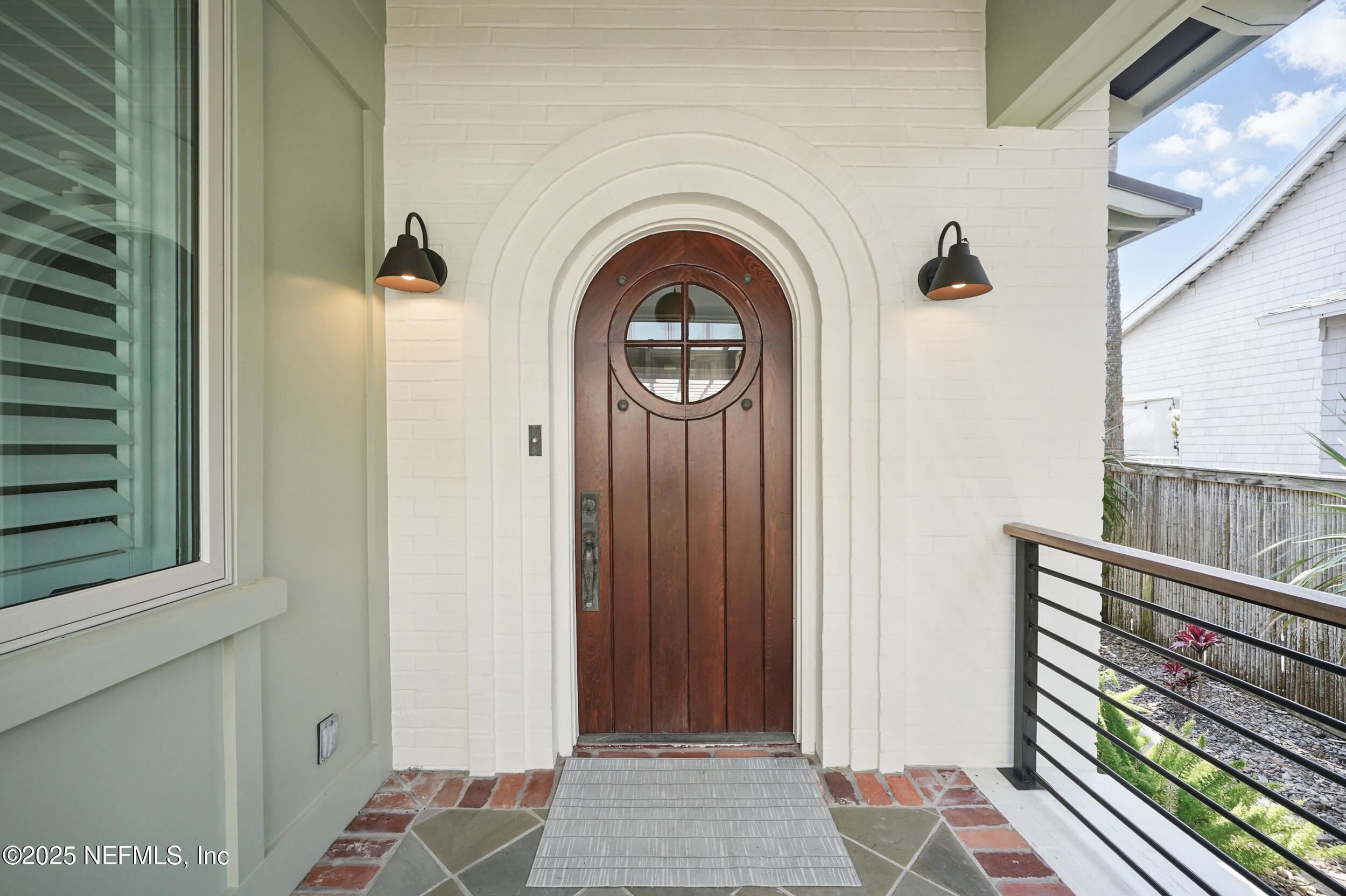 816 Ocean Front Neptune Beach, FL 32266 - Photo 9 of 65 a view of a door with a glass door
