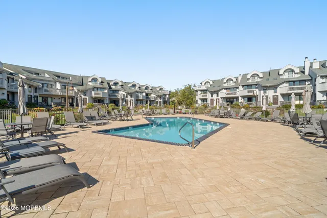 a view of a swimming pool and a buildings