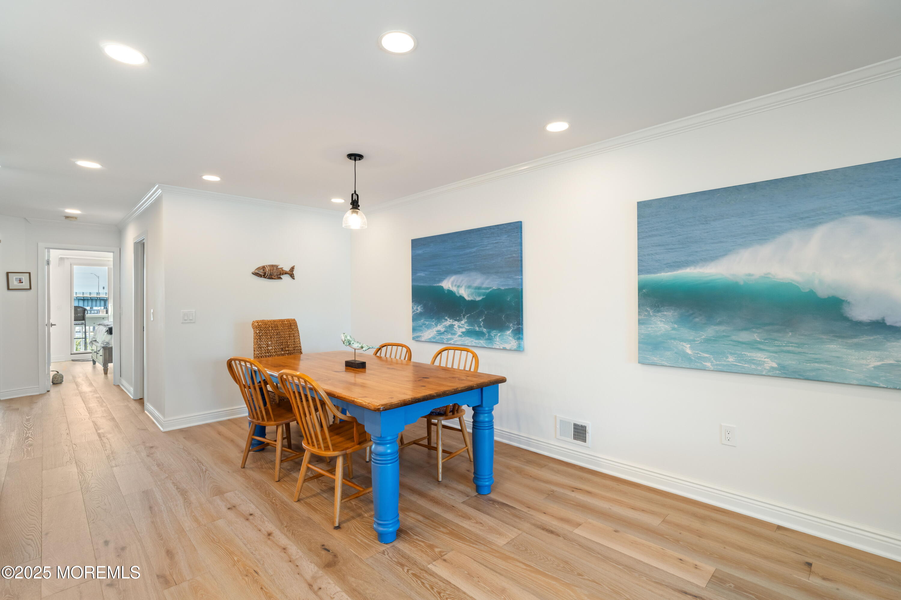 118 Ashley Avenue Brielle, NJ 08730 - Photo 18 of 34 a dining room with furniture and wooden floor