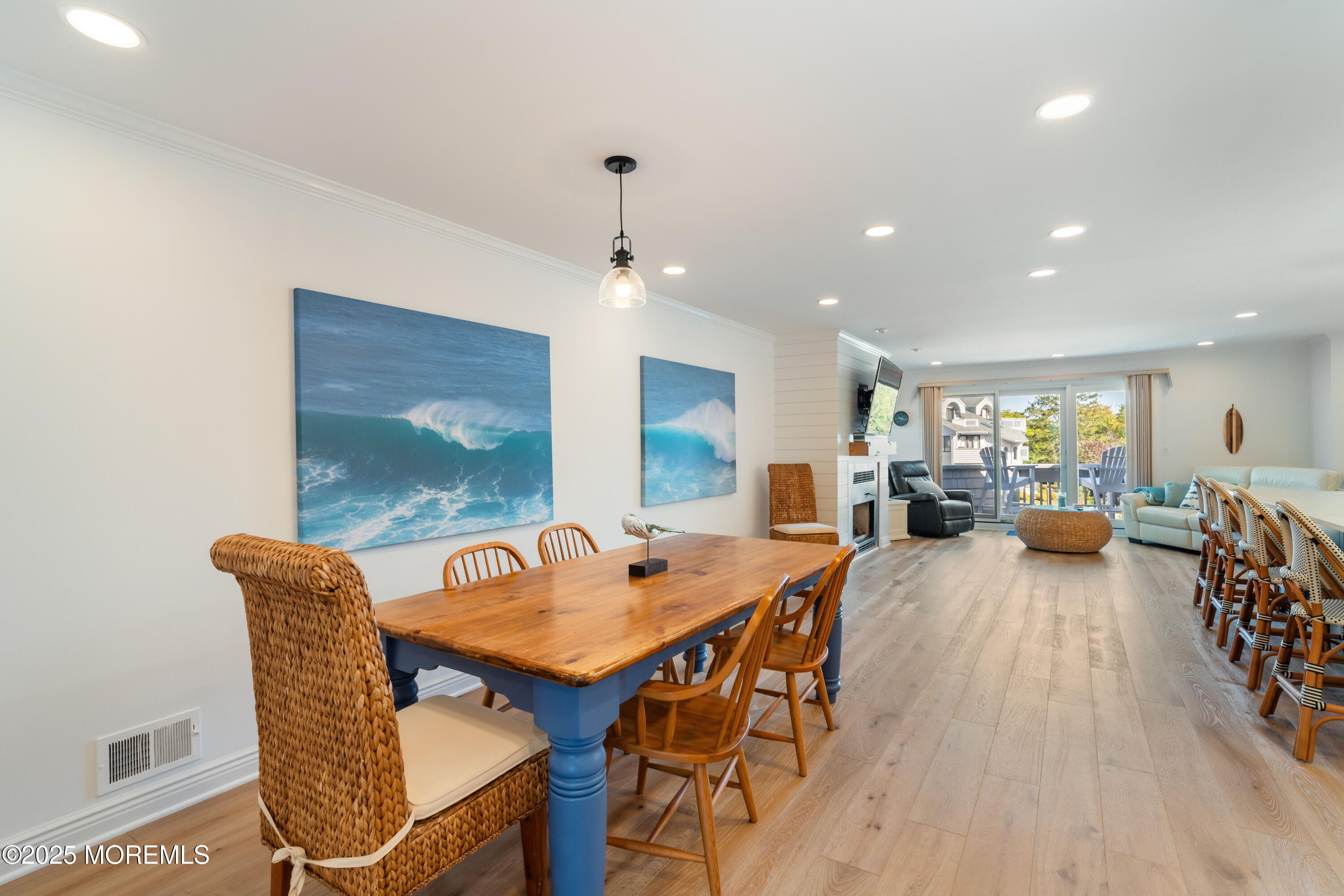 118 Ashley Avenue Brielle, NJ 08730 - Photo 19 of 34 a dining room with furniture and wooden floor