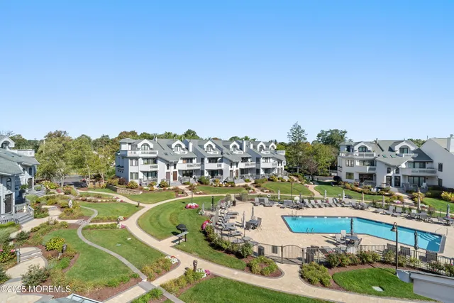 a view of a city with lawn chairs