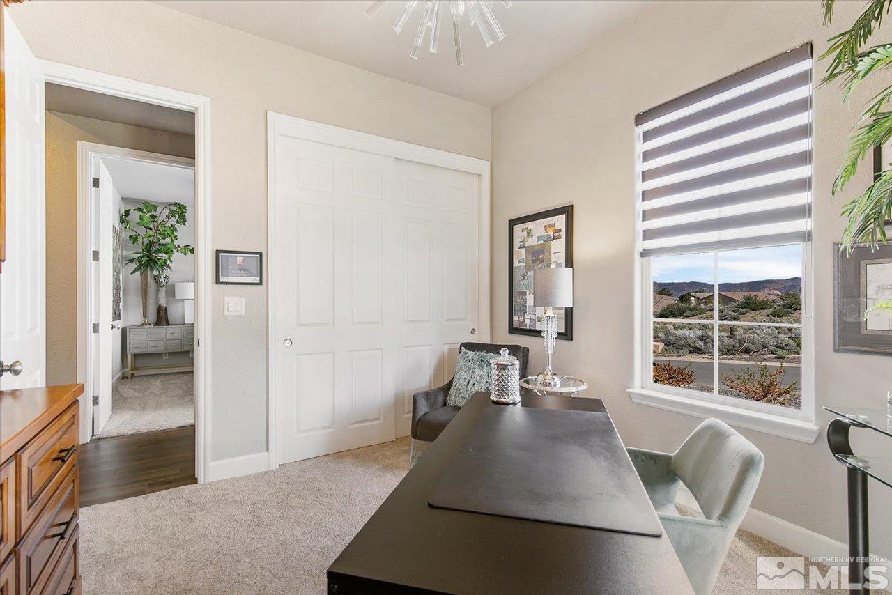 2956 Flint Ridge Court Reno, NV 89511 - Photo 34 of 40 a living room with furniture and a large window