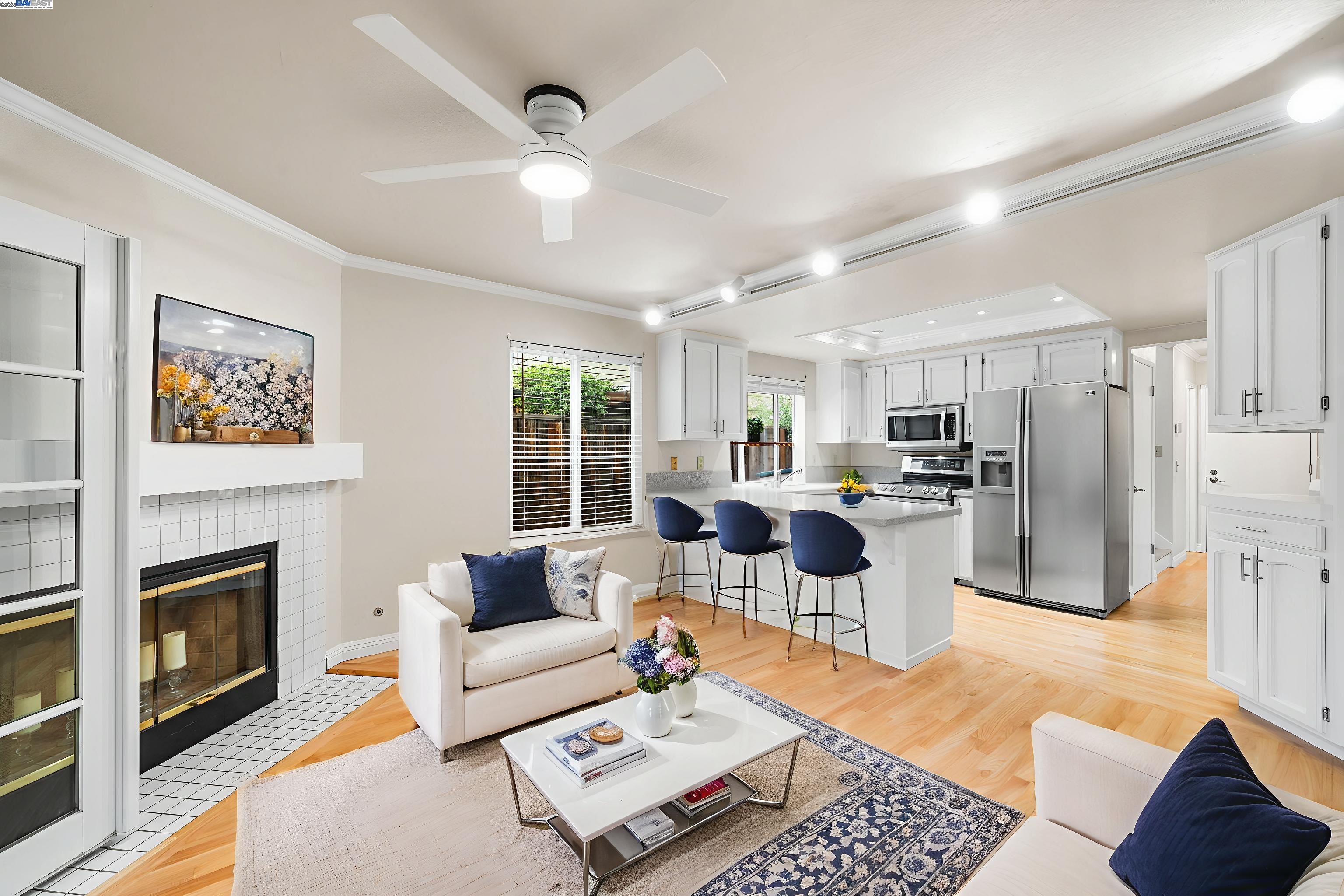 2864 El Capitan Drive Pleasanton, CA 94566 - Photo 14 of 45 a living room with furniture and a fireplace