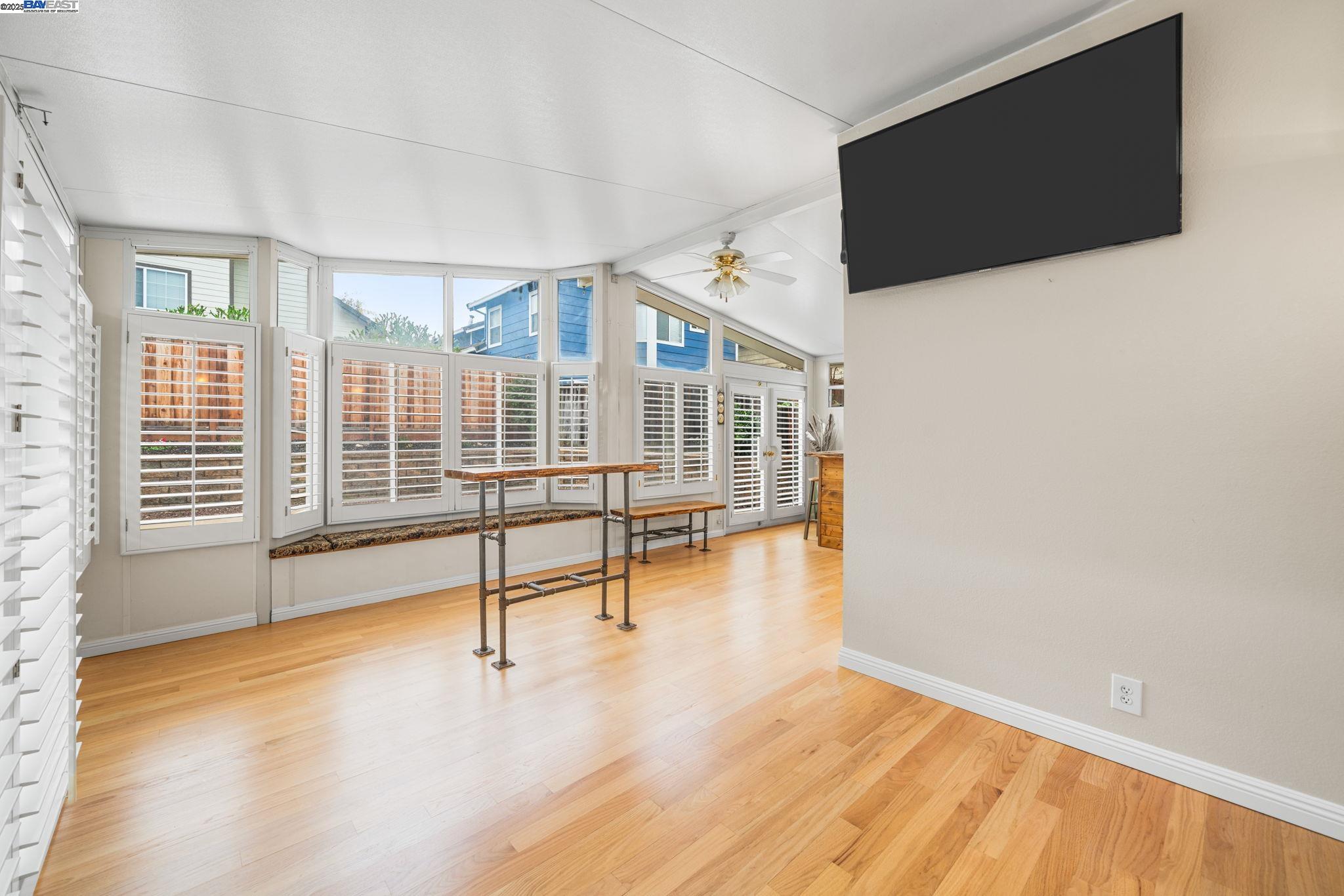 2864 El Capitan Drive Pleasanton, CA 94566 - Photo 17 of 45 a view of a livingroom with wooden floor and windows