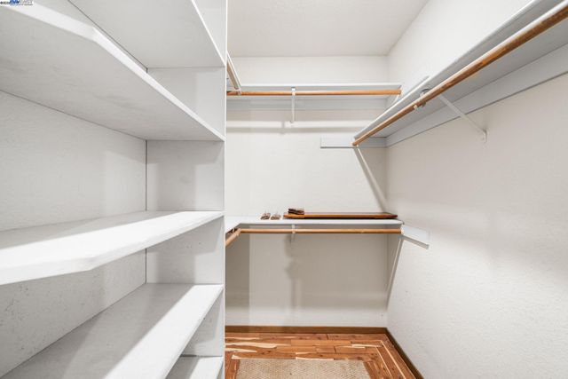 a view of an empty walk in closet