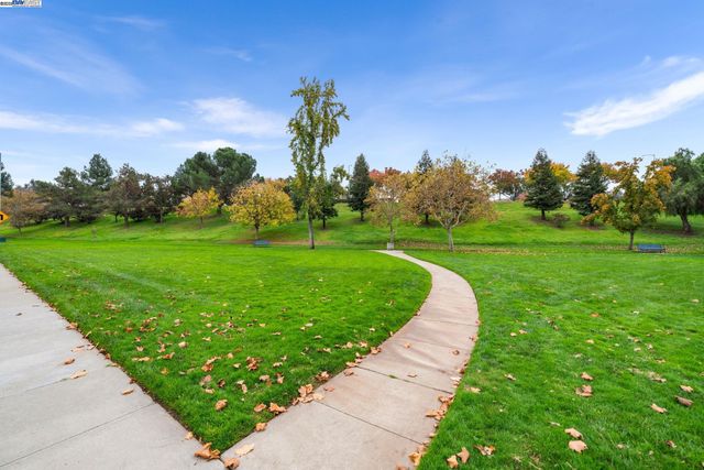 a view of a golf course with a garden
