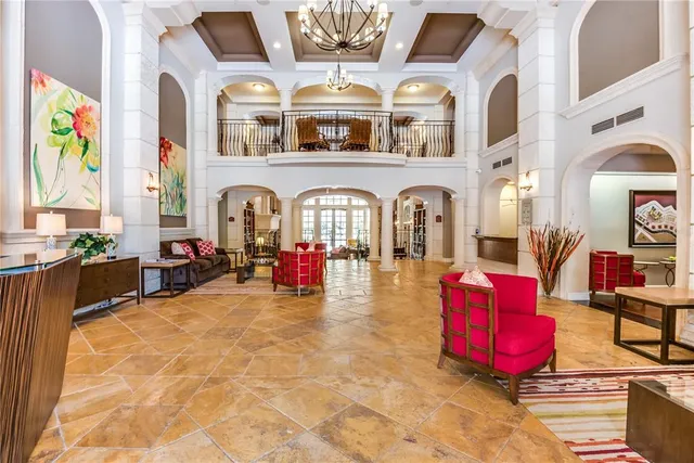 a view of a swimming pool with a lounge chairs
