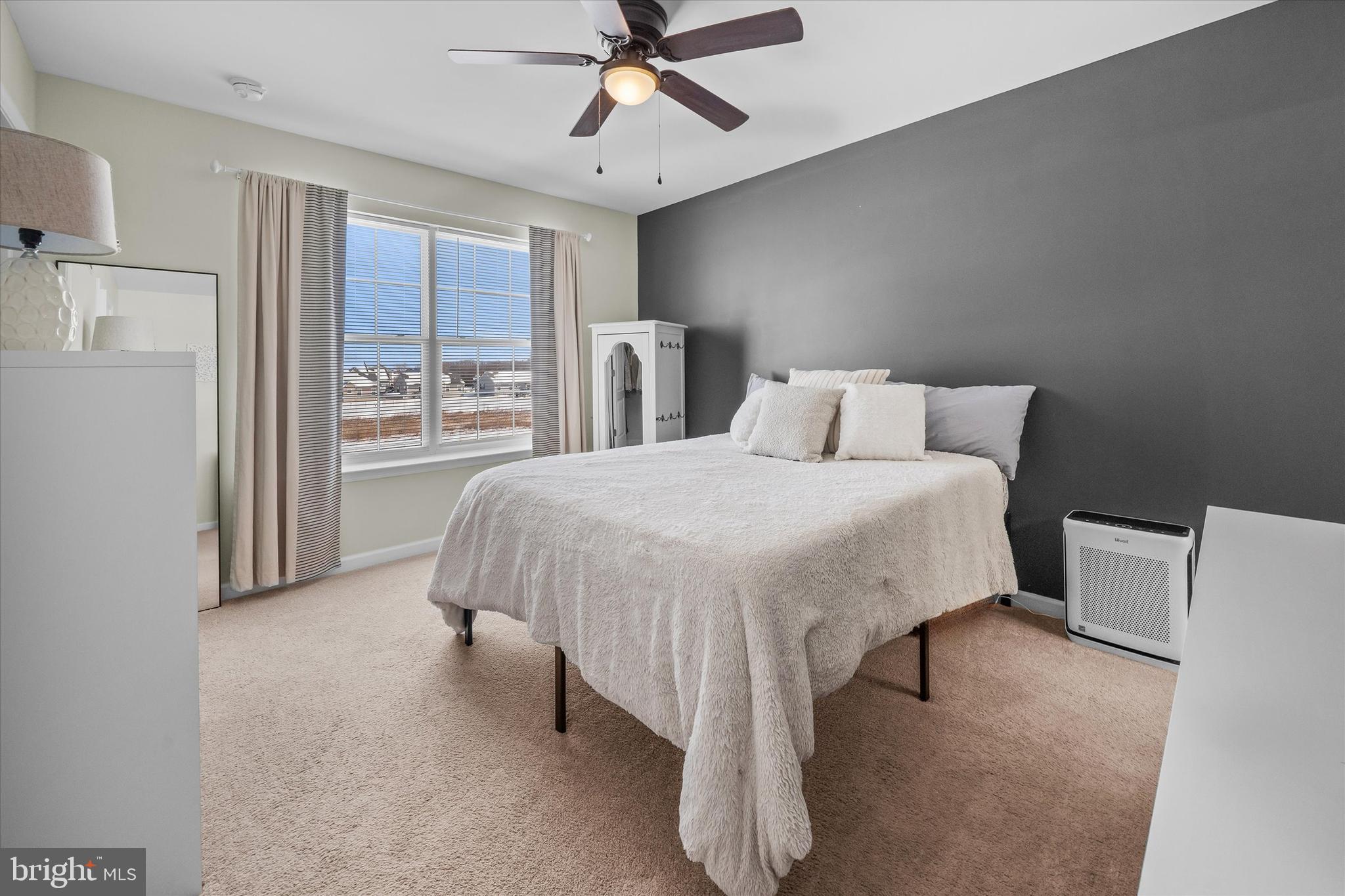 312 Doylestown Road Smyrna, DE 19977 - Photo 21 of 36 a bedroom with a bed and window