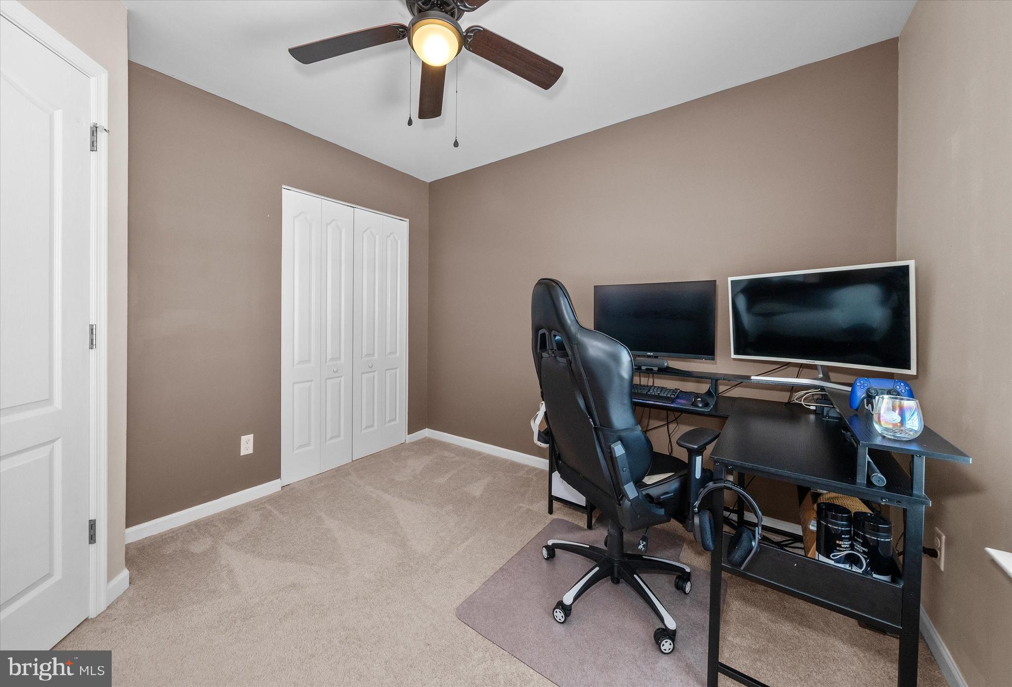 312 Doylestown Road Smyrna, DE 19977 - Photo 28 of 36 a view of a livingroom with furniture and a flat screen tv