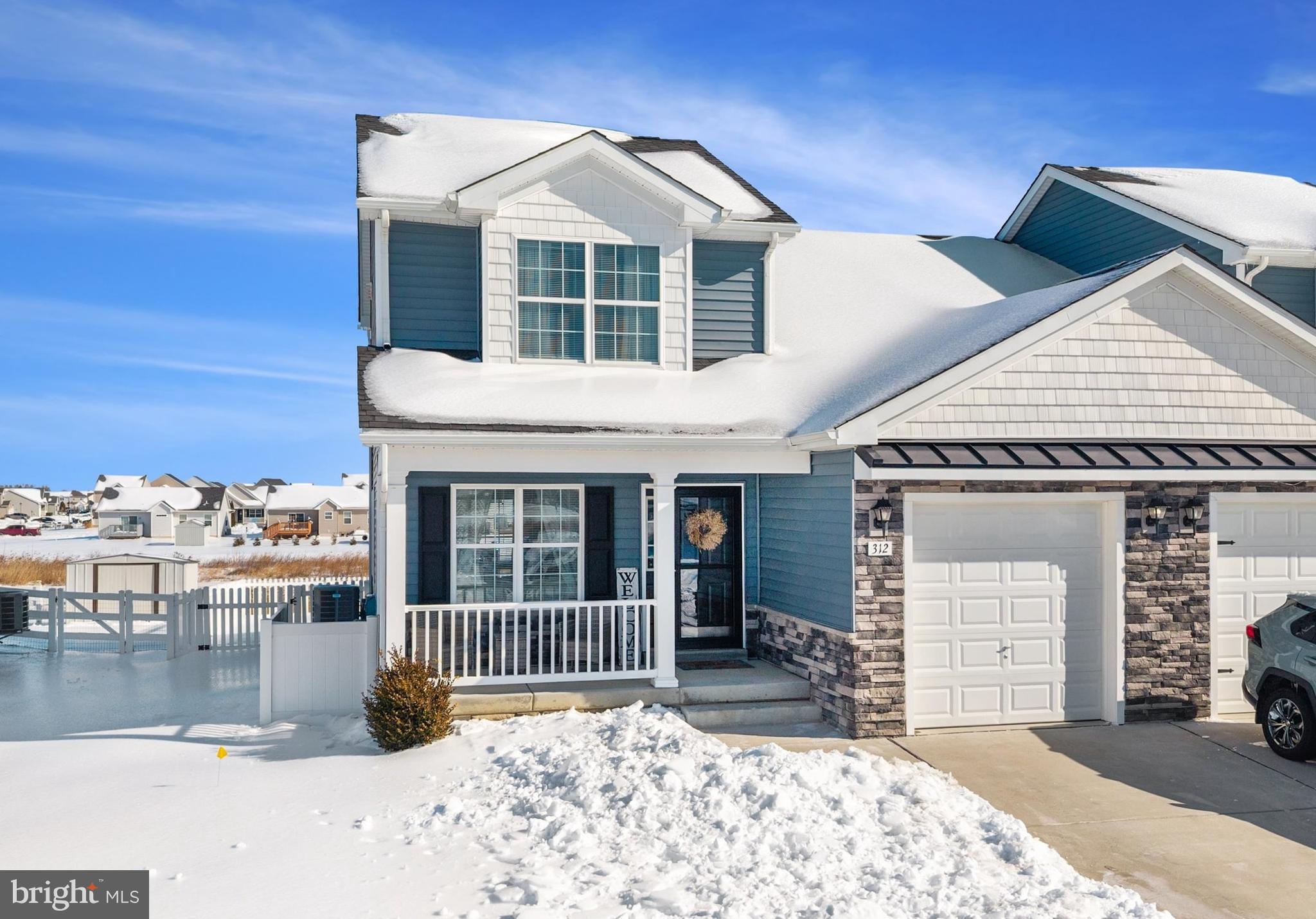312 Doylestown Road Smyrna, DE 19977 - Photo 3 of 36 a front view of a house with a yard
