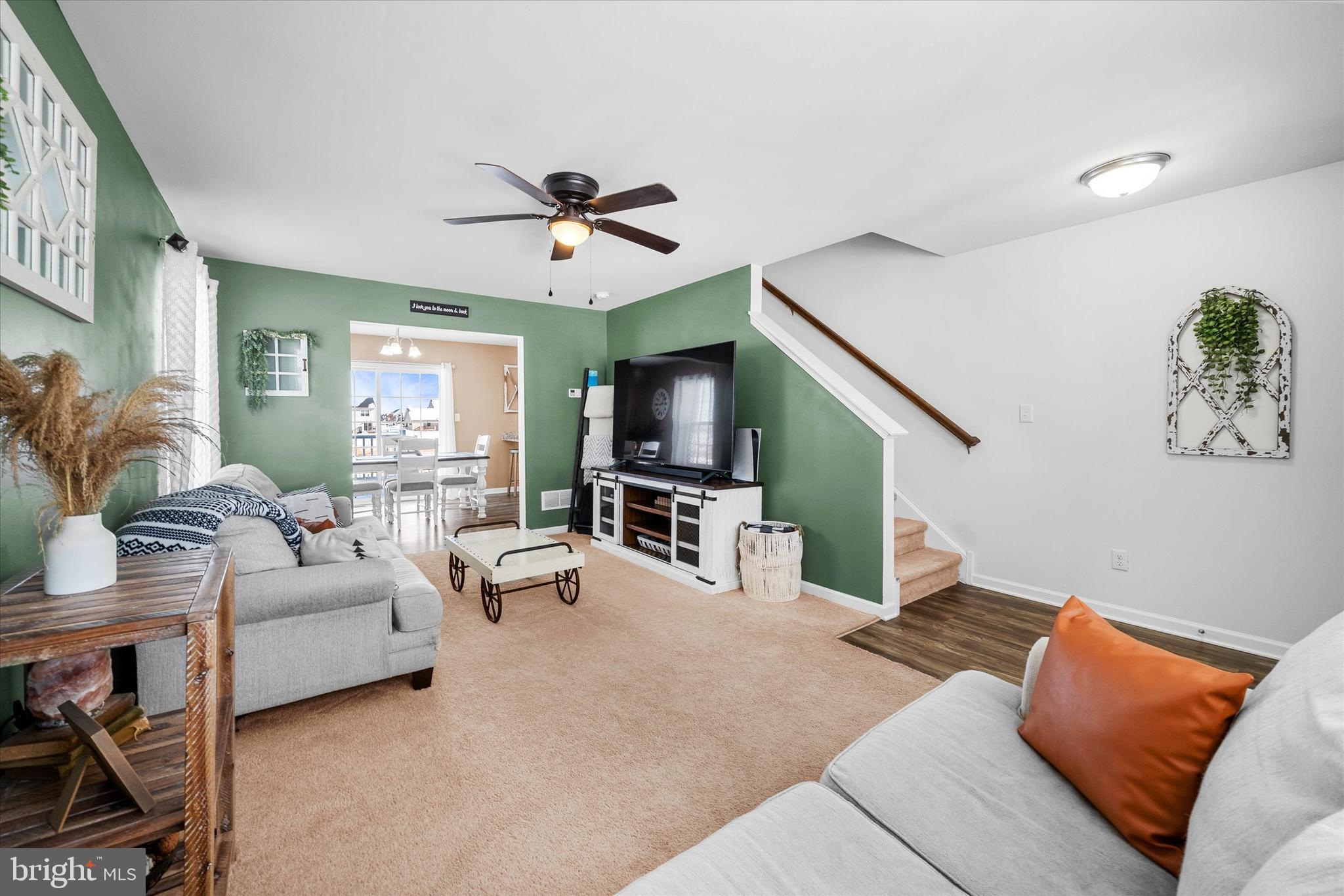 312 Doylestown Road Smyrna, DE 19977 - Photo 7 of 36 a living room with furniture and a flat screen tv