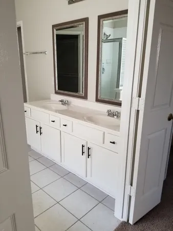 a bathroom with a toilet a sink and bathtub