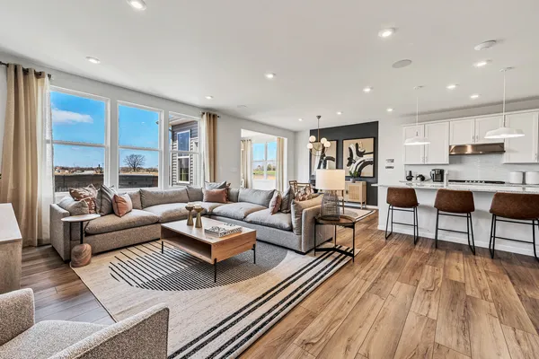 a living room with furniture and a table
