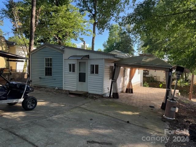 a view of a house with a patio