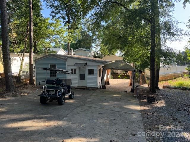 105 River Ridge Trail Mount Gilead, NC 27306 - Photo 12 of 16 a view of a car park in front of a house