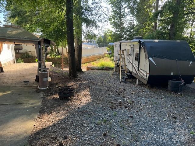 105 River Ridge Trail Mount Gilead, NC 27306 - Photo 14 of 16 a view of a backyard with swimming pool