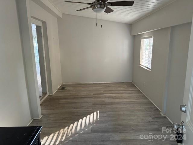 105 River Ridge Trail Mount Gilead, NC 27306 - Photo 8 of 16 a view of a room with wooden floor and white walls