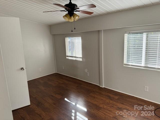 105 River Ridge Trail Mount Gilead, NC 27306 - Photo 9 of 16 a view of an empty room with wooden floor and a window