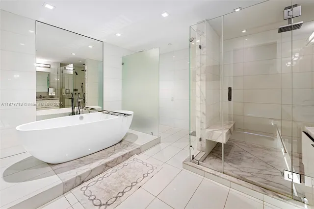 a bathroom with a sink double vanity and a mirror