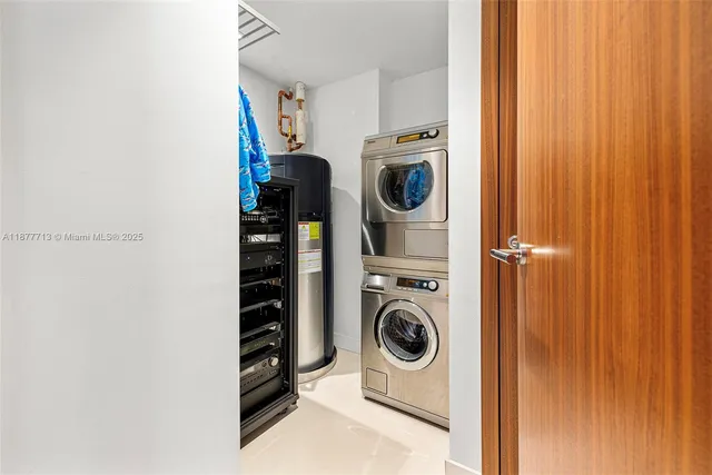 a living room with furniture wooden floor and a large window