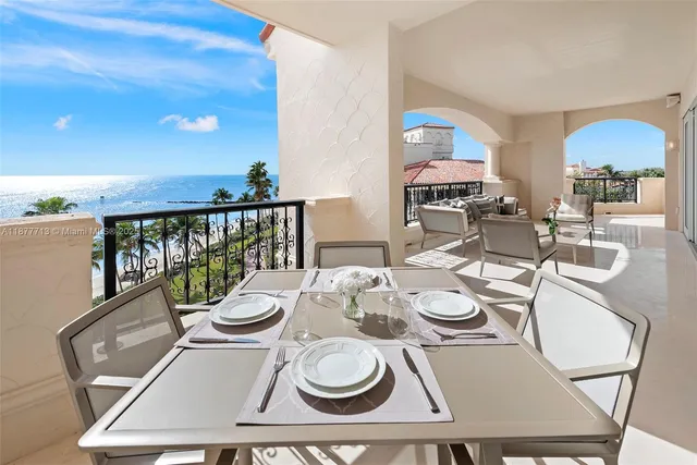 an aerial view of a house with a swimming pool