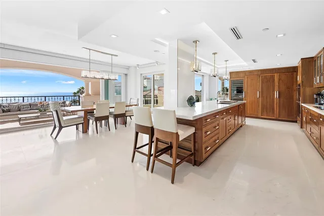 a kitchen with stainless steel appliances granite countertop a sink and cabinets