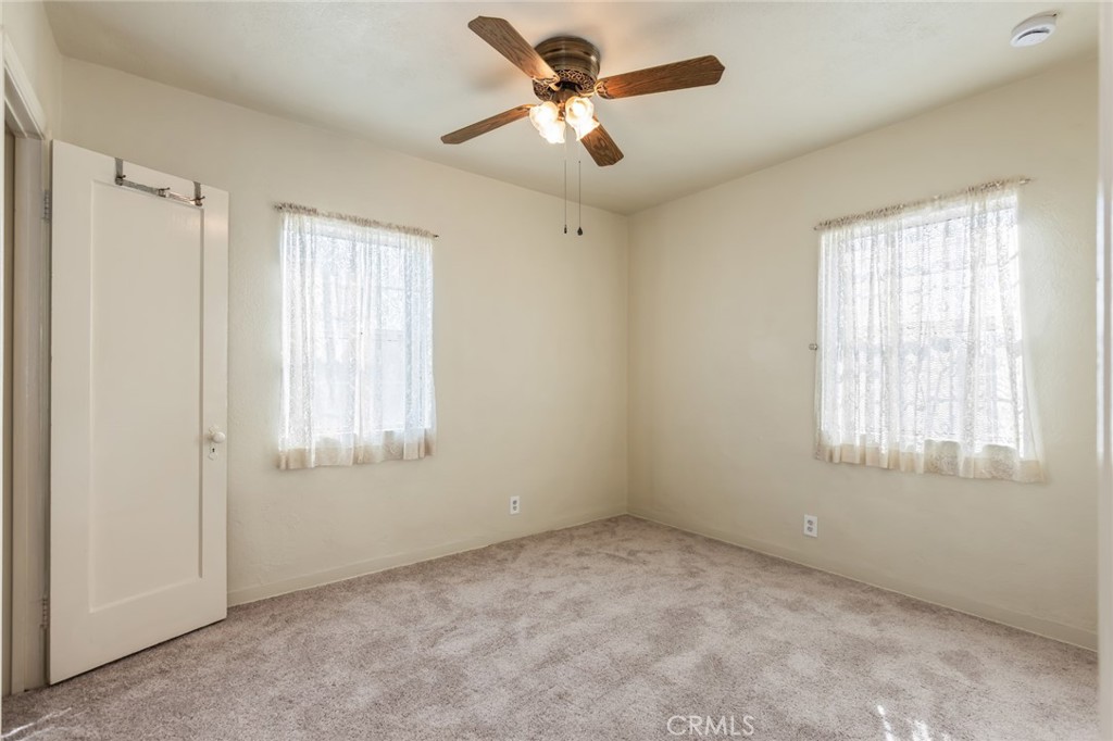 1001 West 134th Street Compton, CA 90222 - Photo 23 of 44 a view of an empty room with a window