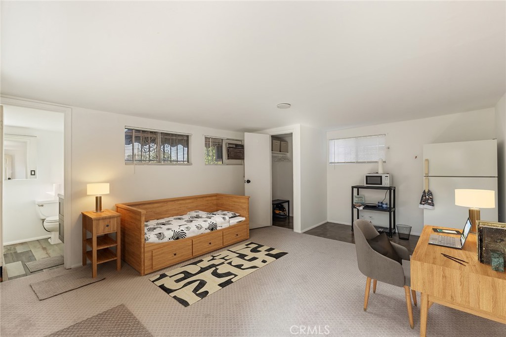 1001 West 134th Street Compton, CA 90222 - Photo 28 of 44 a bedroom with furniture and a dresser