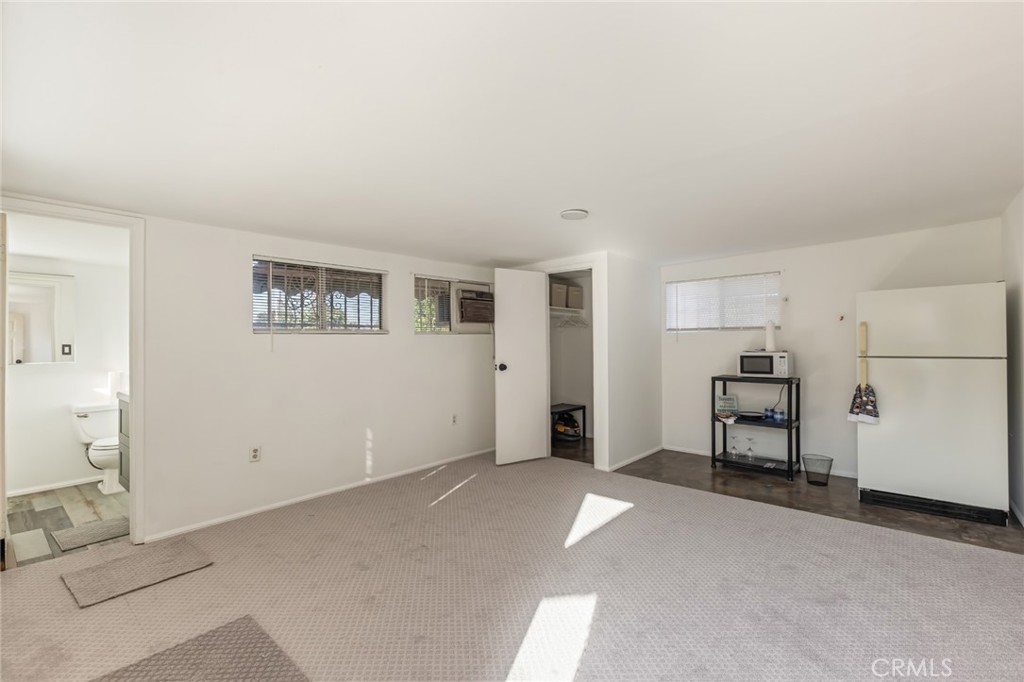 1001 West 134th Street Compton, CA 90222 - Photo 29 of 44 a view of empty room with cabinet and mirrors