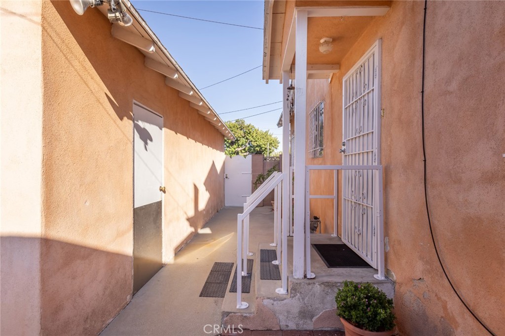1001 West 134th Street Compton, CA 90222 - Photo 34 of 44 a view of a staircase and a potted plants next to a road