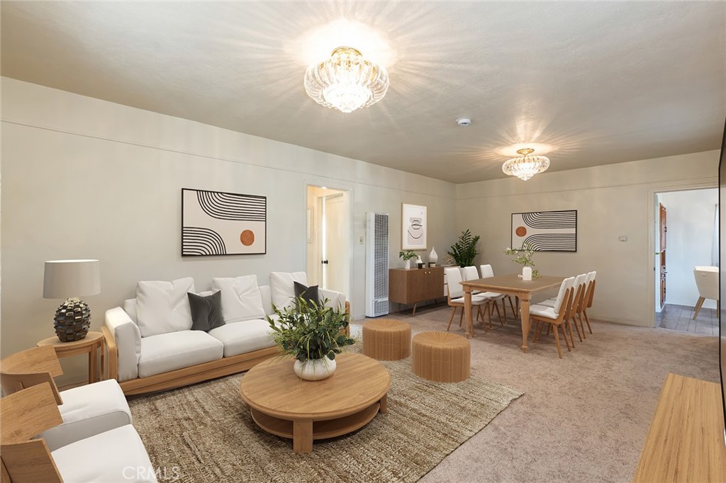 1001 West 134th Street Compton, CA 90222 - Photo 9 of 44 a living room with furniture potted plant and a window